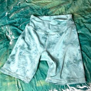 Teal biker shorts, tight back pocket